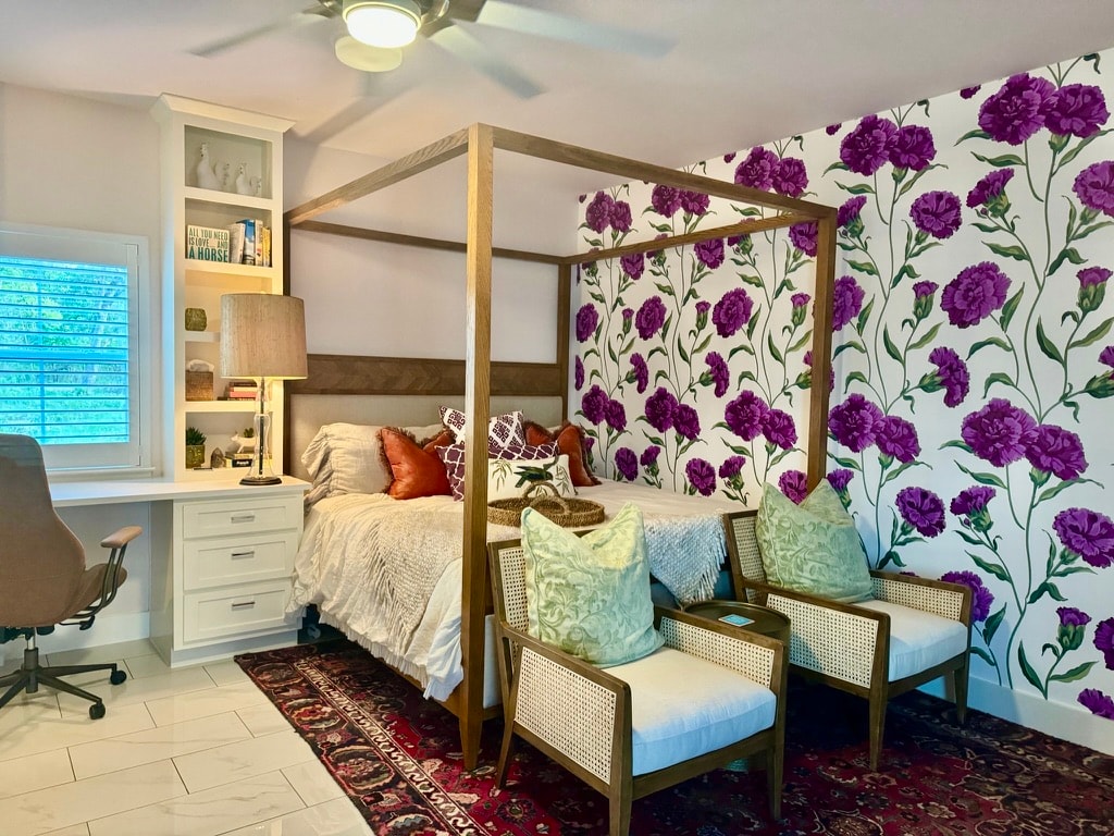 Vacation rental — bedroom with floral wallpaper accent wall